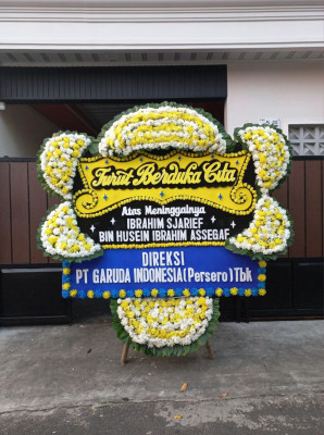 Papan Bunga Duka di Passue Bawah