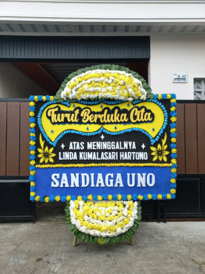 Papan Bunga Duka di Passue Bawah